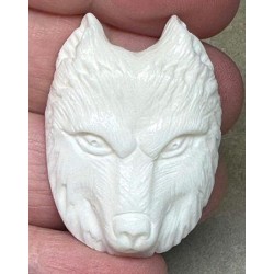 Carved Bone Wolf Face
